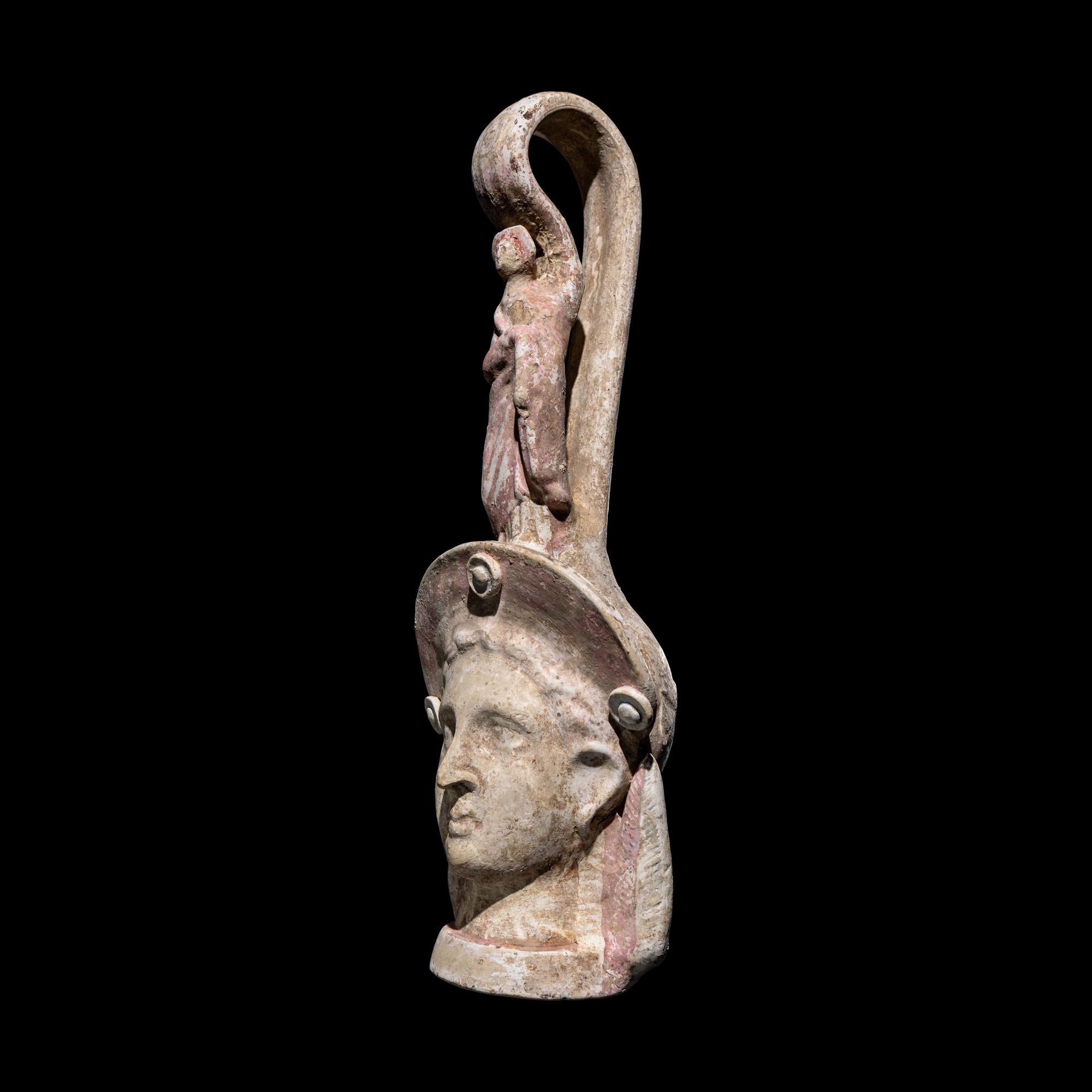 A Canosan Painted Terracotta Figural Oinochoe