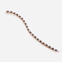 A diamond, sapphire, and fourteen karat gold bracelet