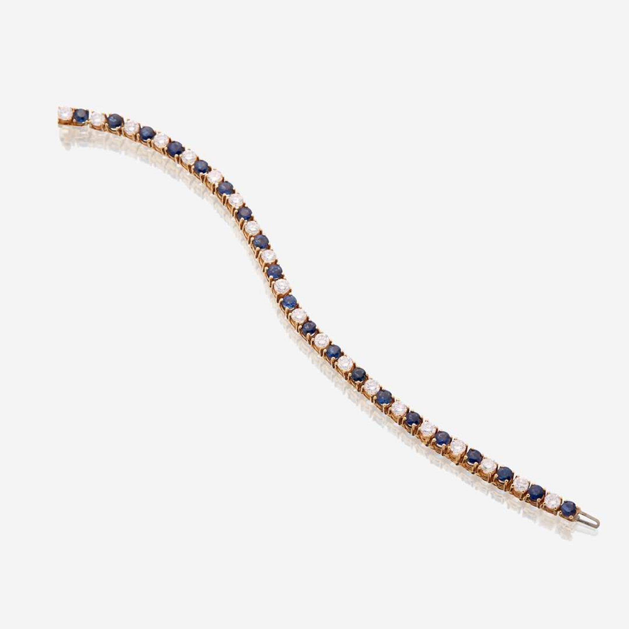 A diamond, sapphire, and fourteen karat gold bracelet