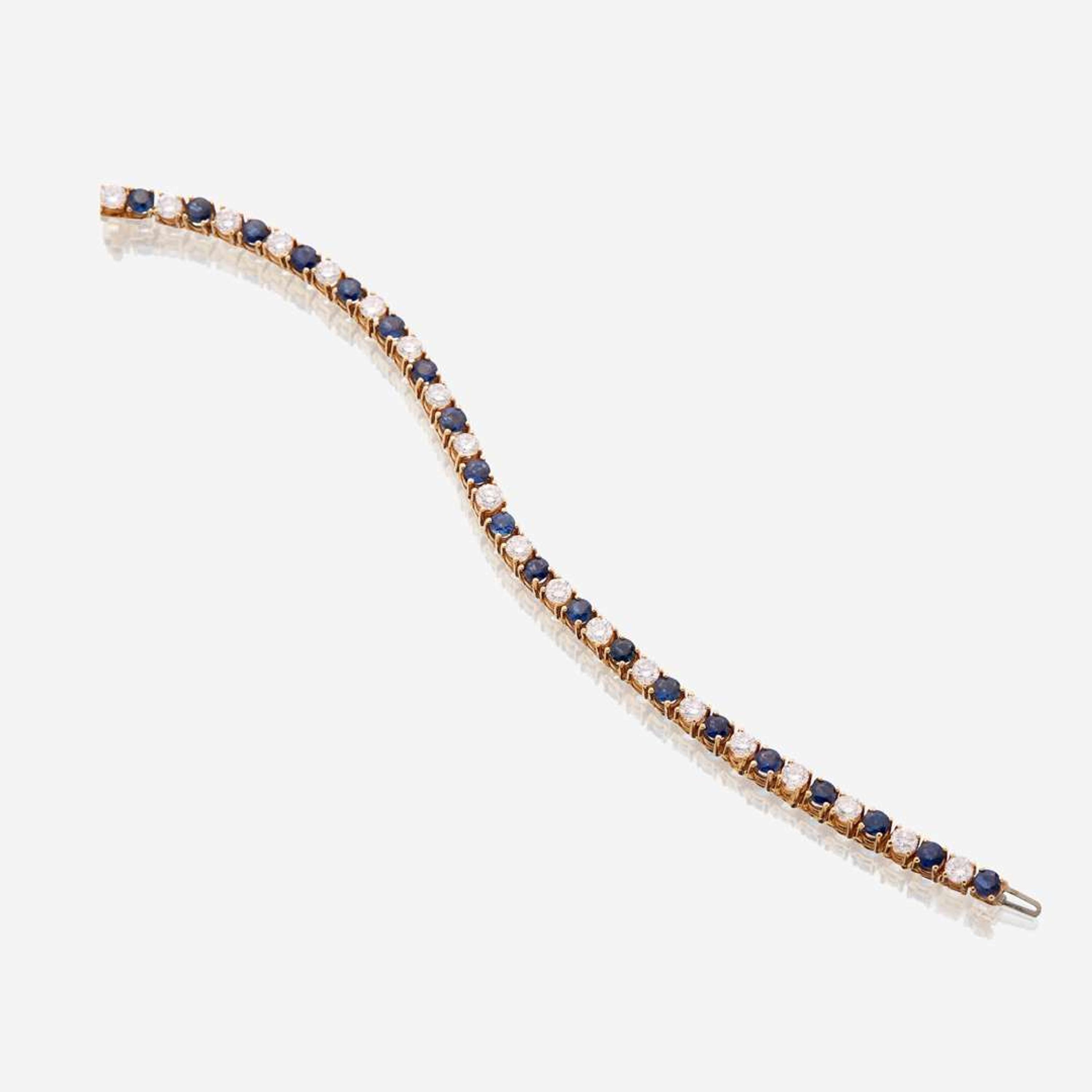 A diamond, sapphire, and fourteen karat gold bracelet