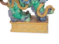 A Pair of Chinese Glazed Ceramic Foo Dogs