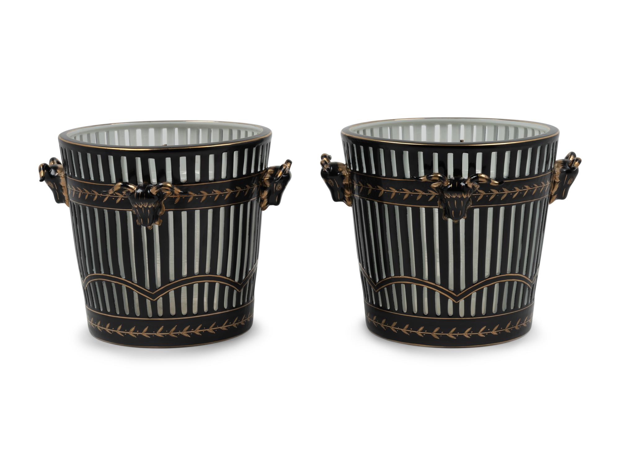 A Pair of Contemporary Reticulated and Parcel Gilt Porcelain Jardinières