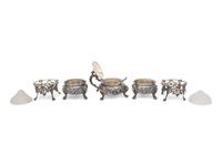 A Pair of English Silver-Gilt Footed Salt Cellars and Covered Condiment Bowl