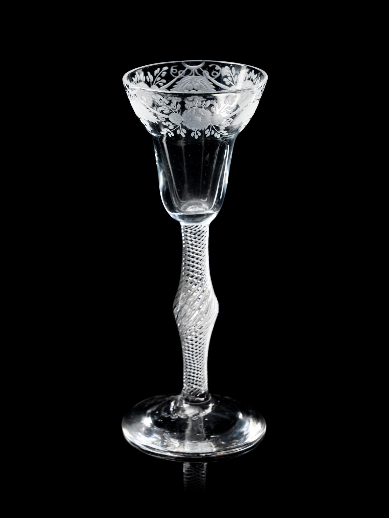 A Group of Three Engraved Wine Glasses
