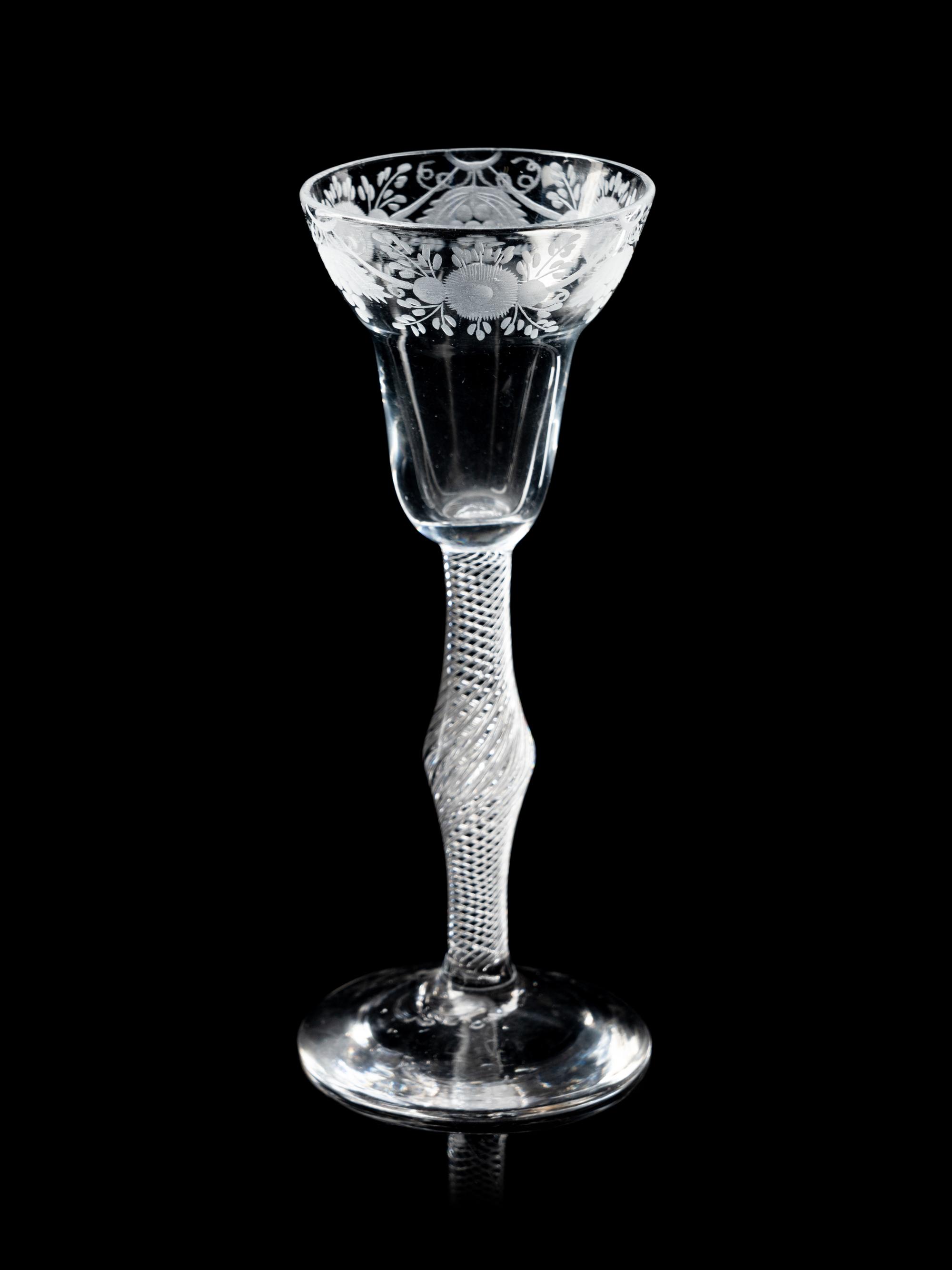 A Group of Three Engraved Wine Glasses