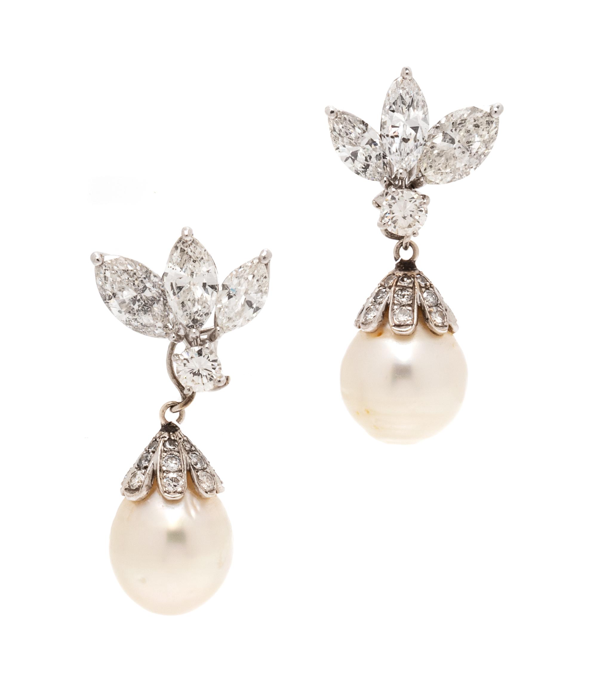 A Pair of Platinum, White Gold, Diamond and Cultured Baroque South Sea Pearl Convertible Earclips, 9.50 dwts.