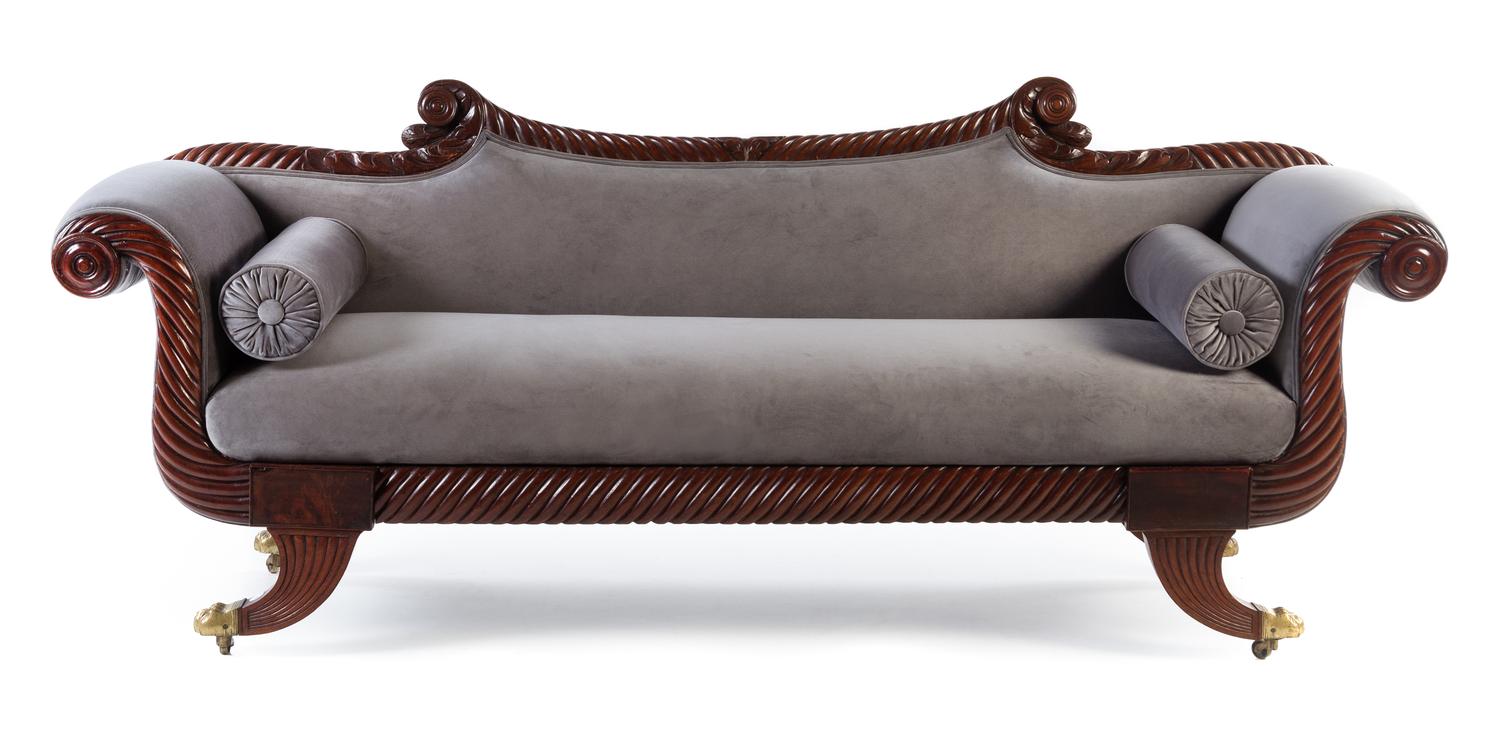 An Empire Mahogany Carved Sofa Height 34 1/2 x width 85 x depth 24 inches. — CIRCA 1850