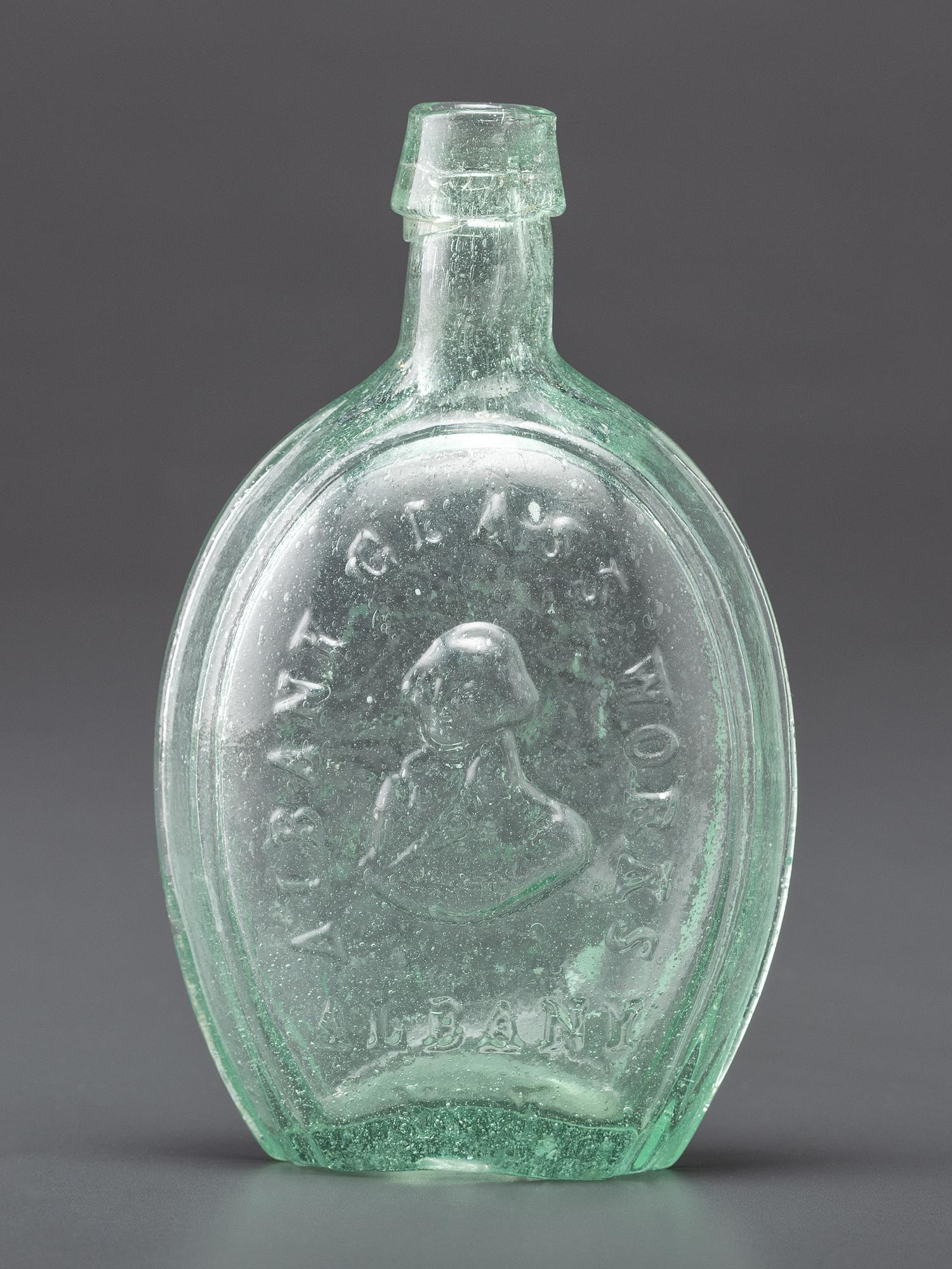 A Molded-Glass New York Flask in Aqua by Albany Glass Works