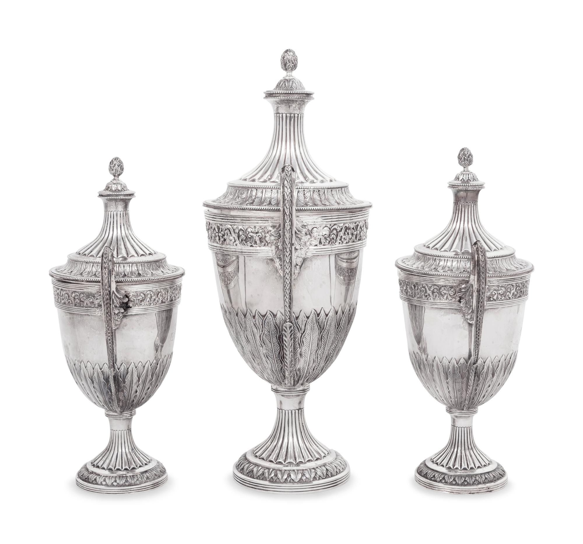 A Set of Three English Silver Covered Urns
