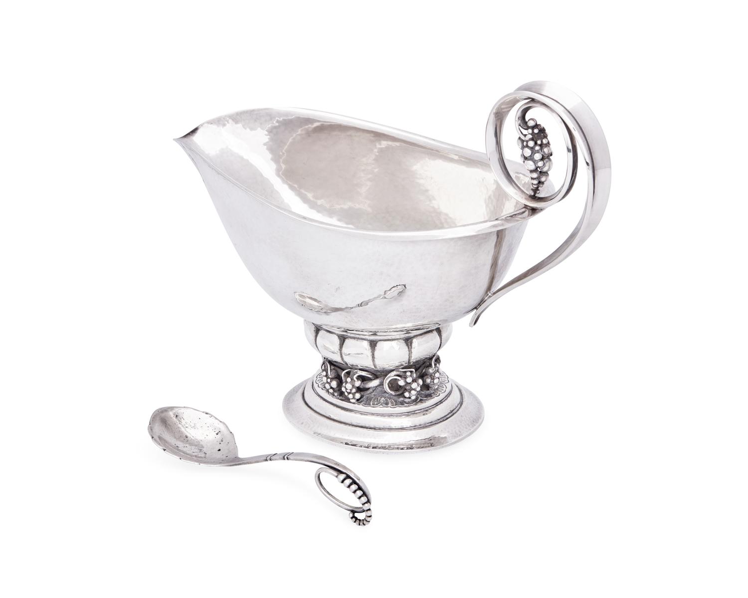 A Georg Jensen Grapevine Sauceboat with Associated Sugar Scoop