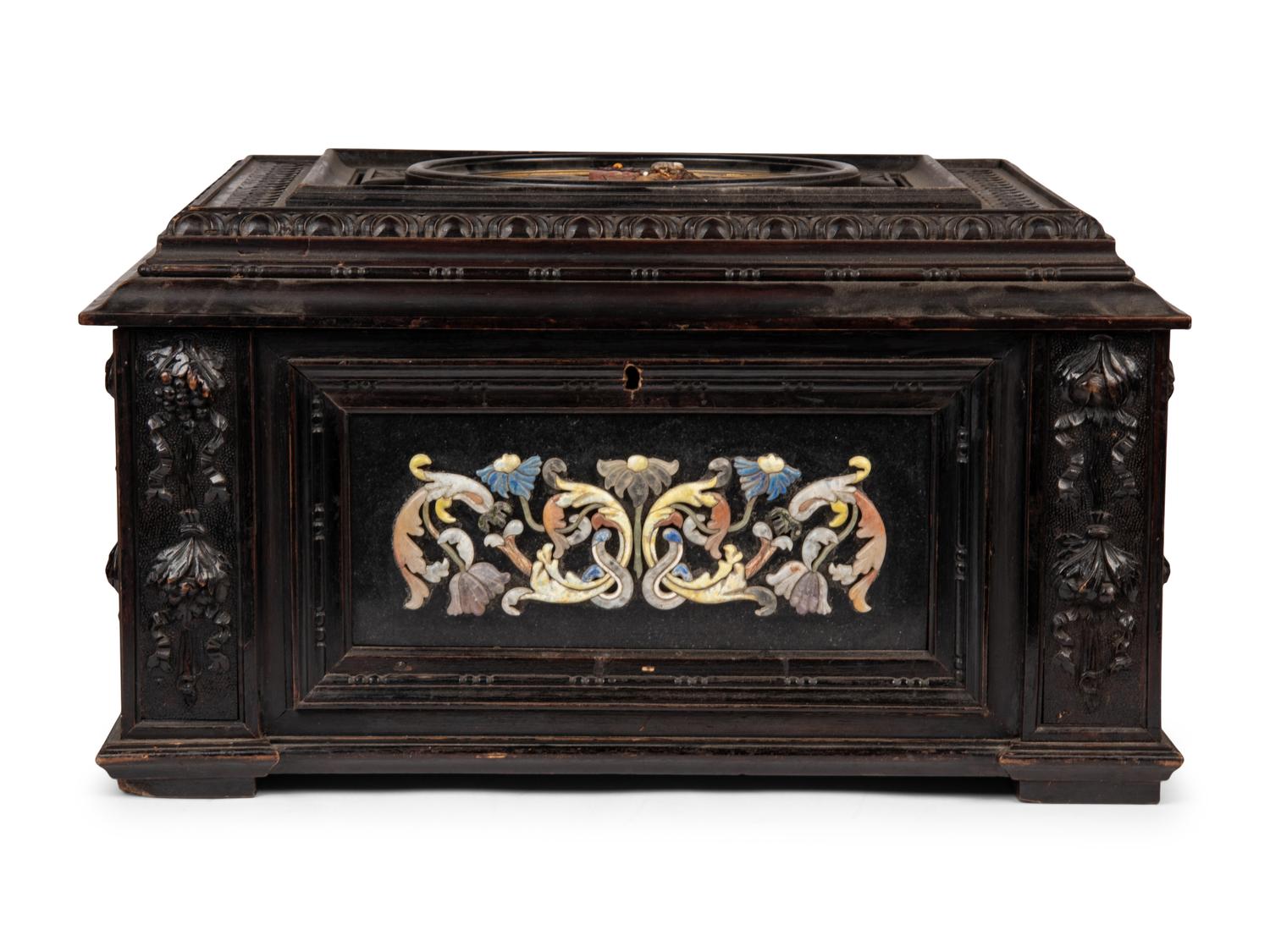 A Continental Baroque Style Hardstone Mounted Ebonized Table Casket