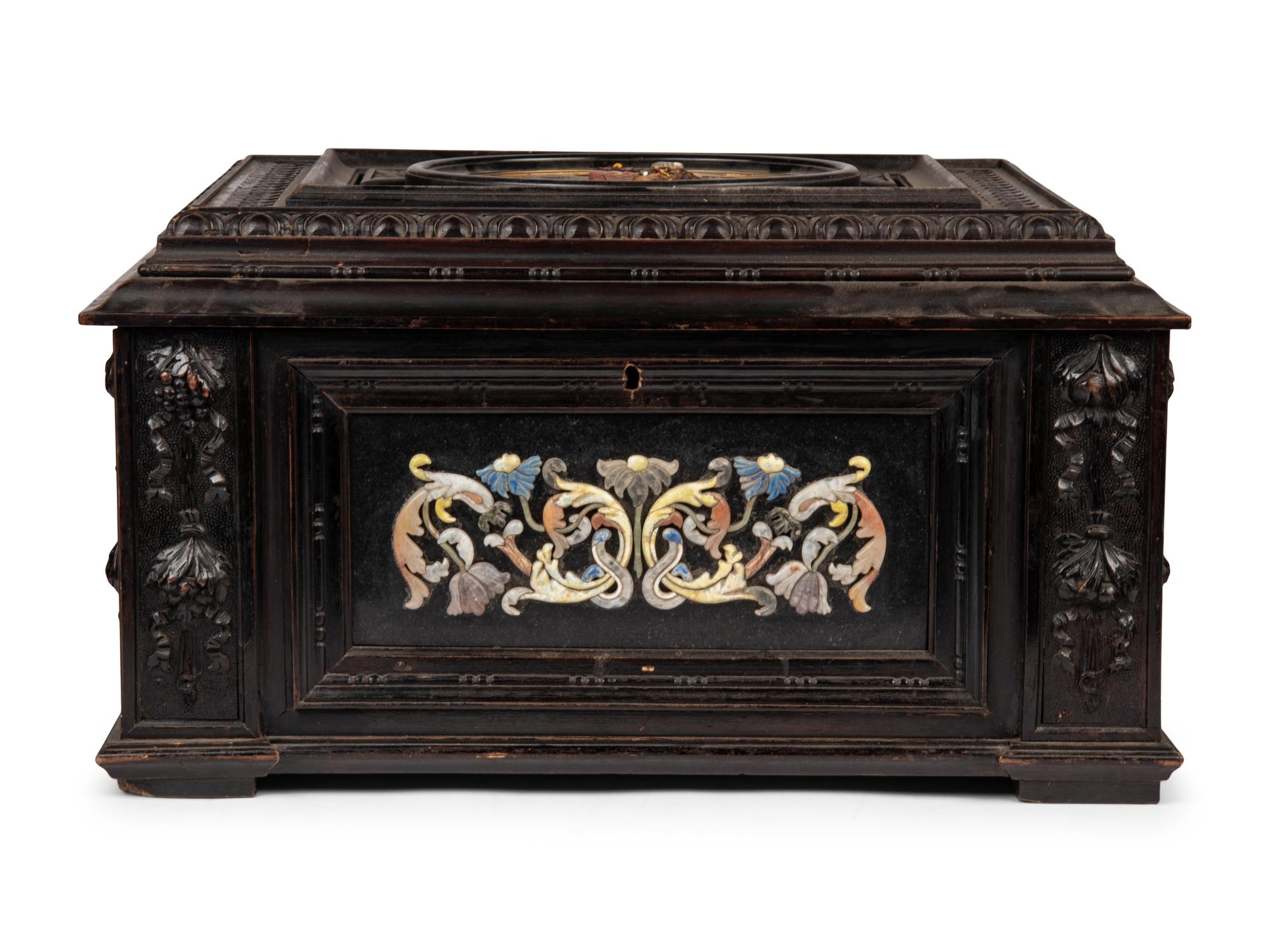 A Continental Baroque Style Hardstone Mounted Ebonized Table Casket