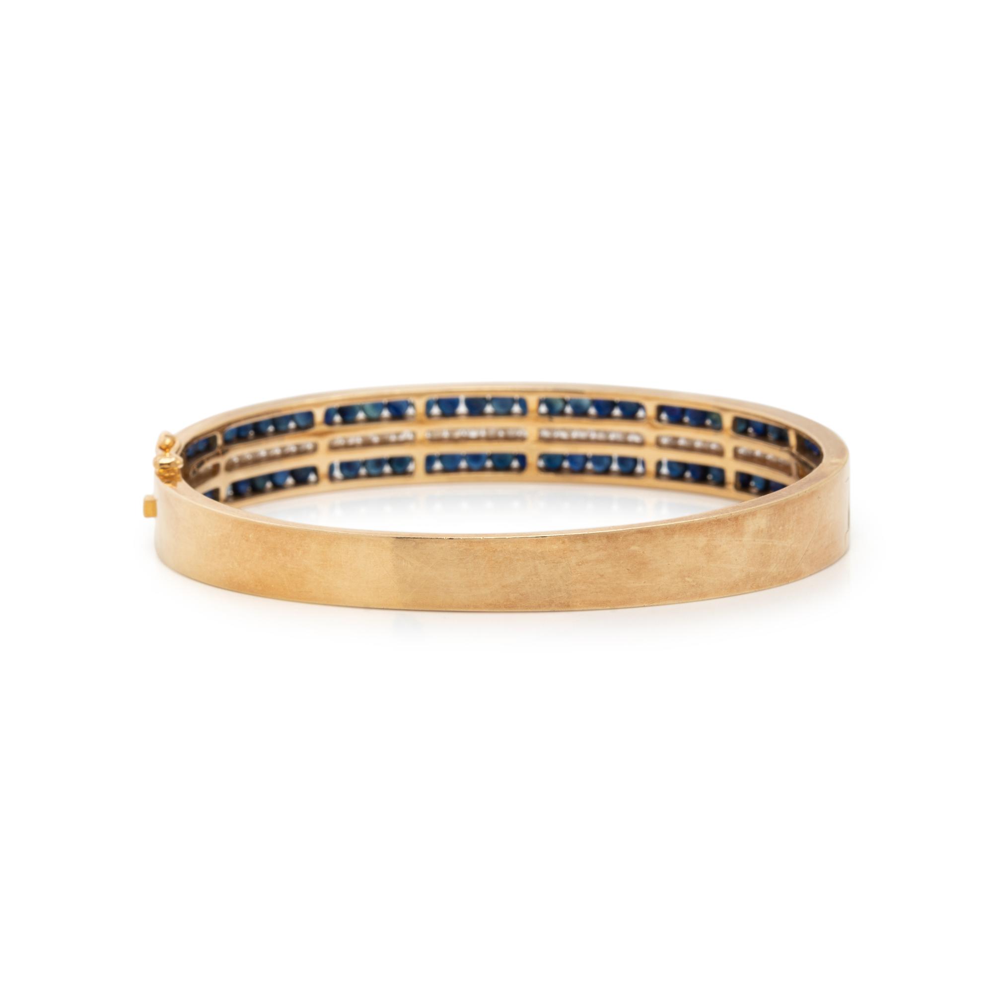 YELLOW GOLD, SAPPHIRE AND DIAMOND BANGLE BRACELET