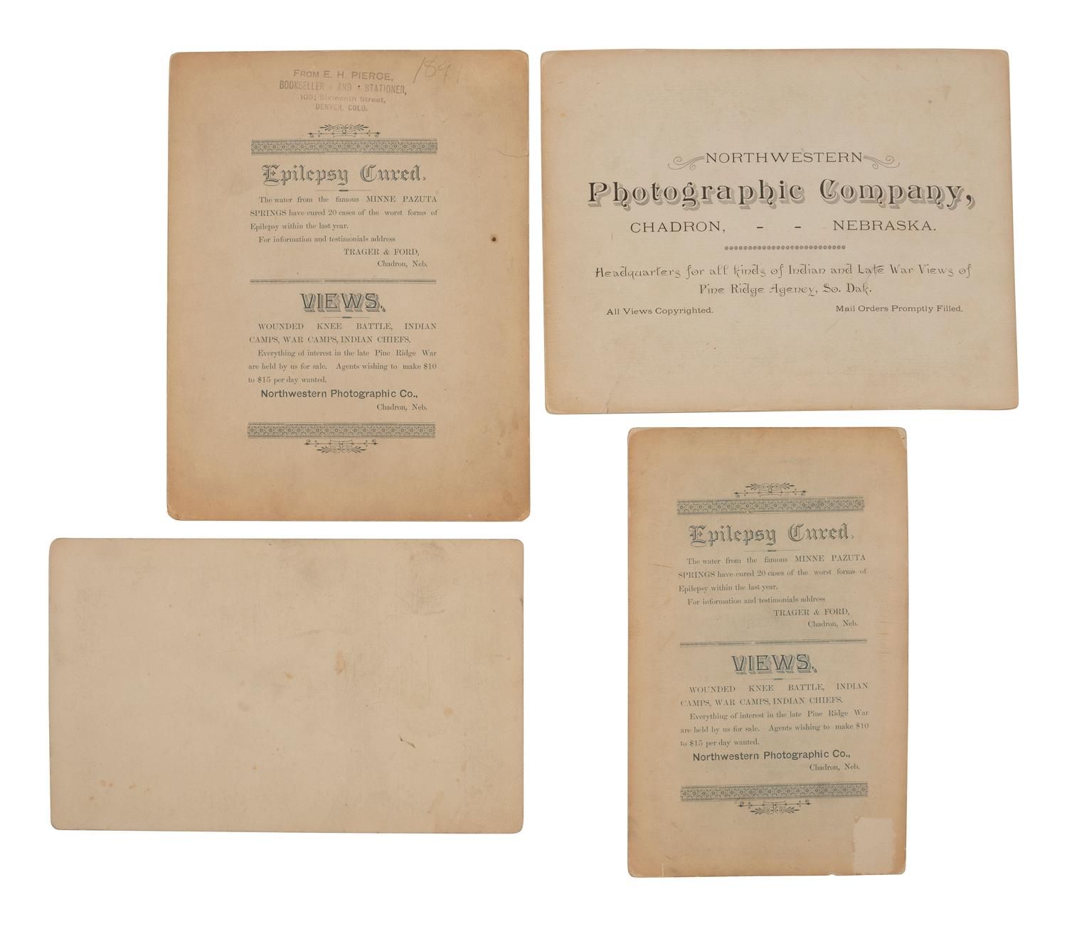 [WOUNDED KNEE]. Four photographs taken in the immediate aftermath of Wounded Knee, incl. views of the slain bodies of Chief Big Foot and the Medicine Man.