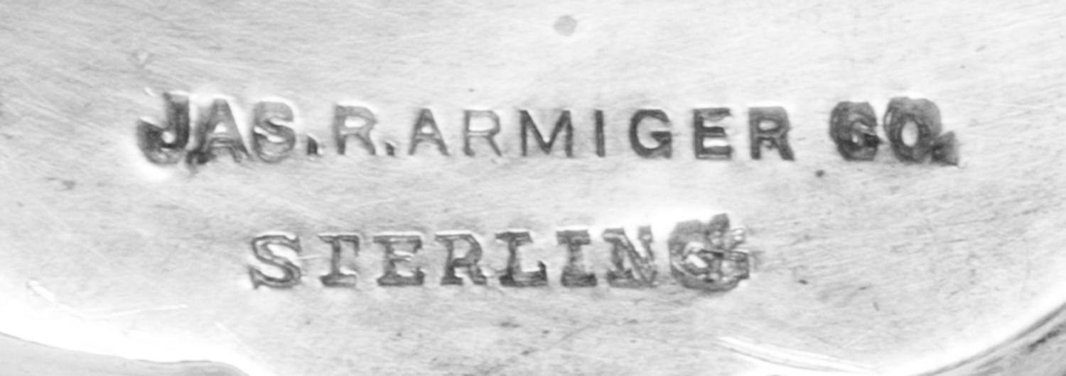An American Silver Punch Bowl, James R. Armiger Co., Baltimore, MD, the body with repousee floral and foliate decoration throughout, ra