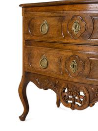 A Louis XV Style Walnut Commode