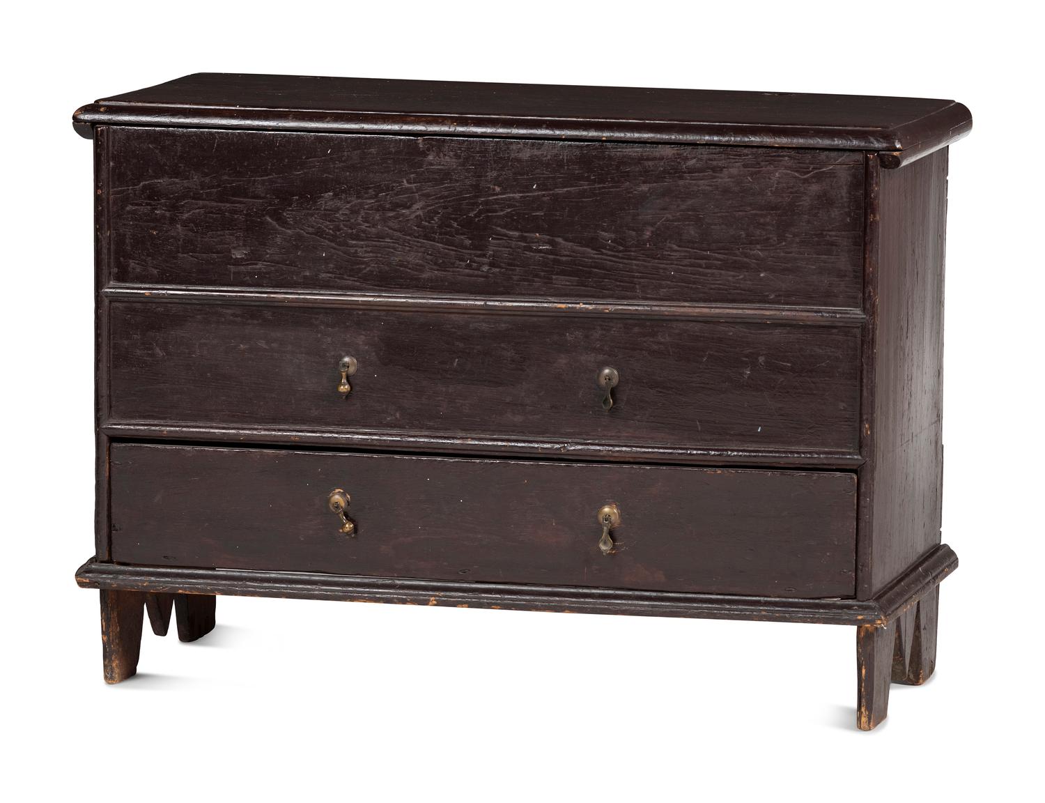 A Rare Pilgrim Century Black Painted Pine One-Drawer 'M' Chest