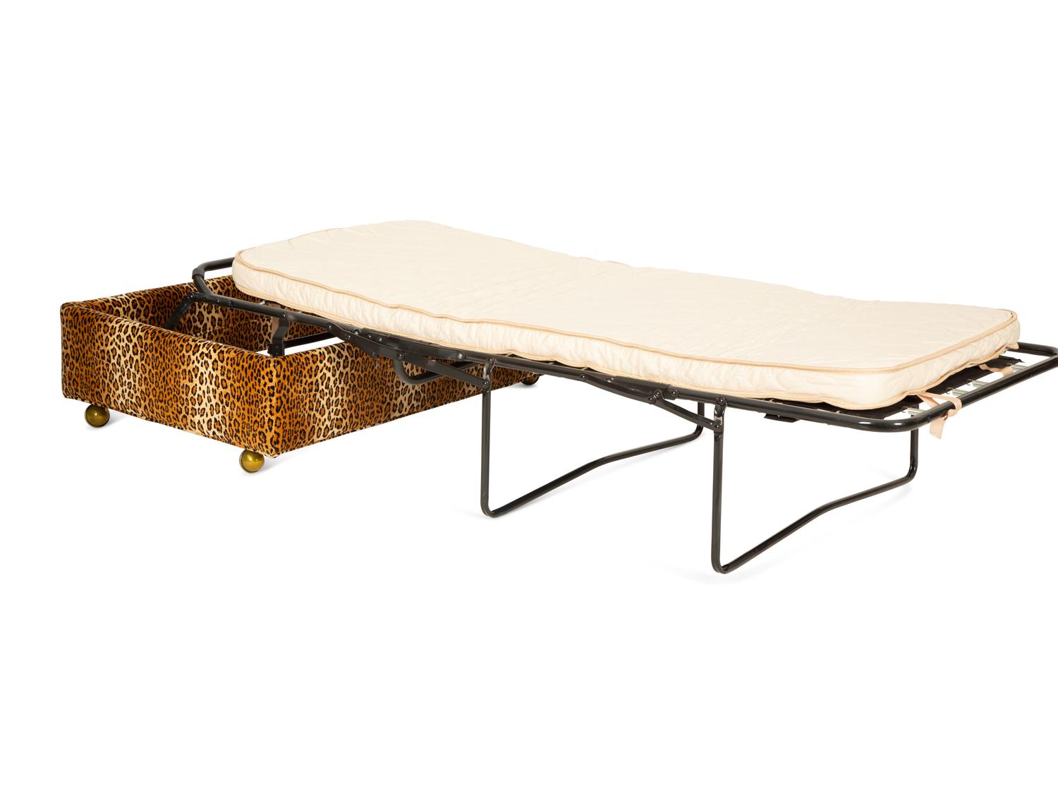 A Carlye Cheetah Print Upholstered Convertible Ottoman