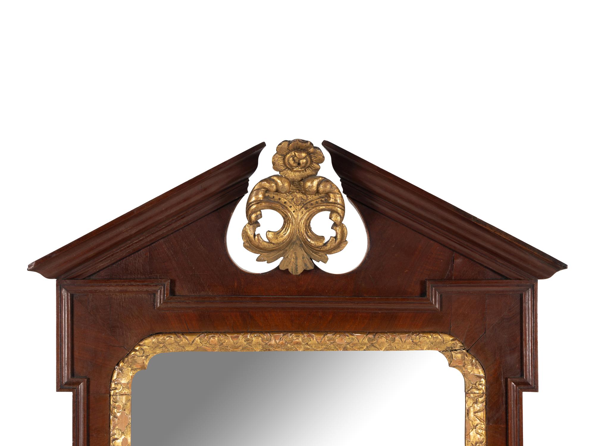 A Late George III Carved Mahogany and Parcel Gilt Mirror