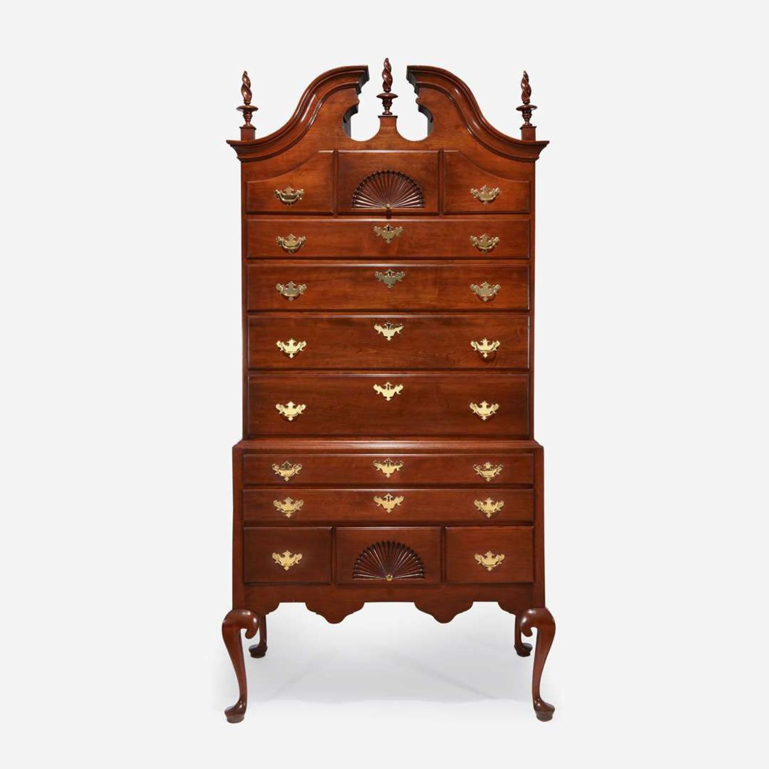 A Queen Anne carved cherry bonnet-top high chest New England, possibly Rhode Island, circa 1775