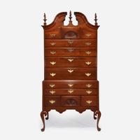 A Queen Anne carved cherry bonnet-top high chest New England, possibly Rhode Island, circa 1775