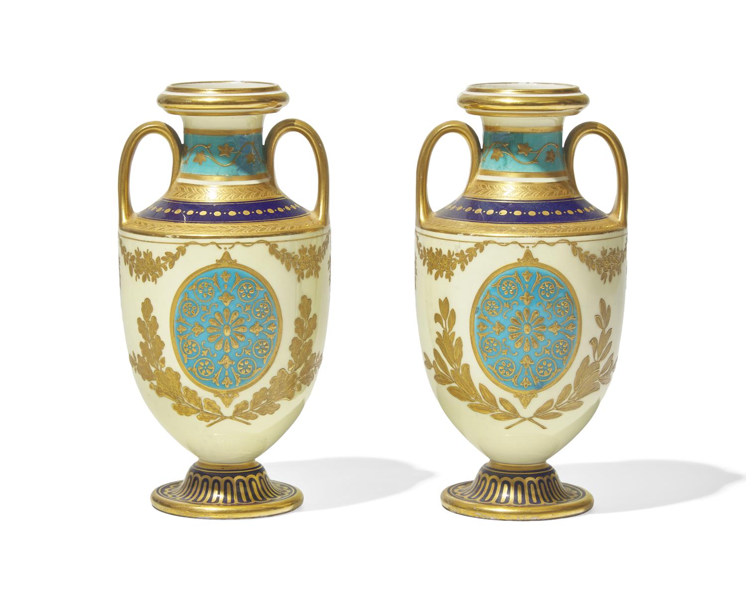 A Pair of English Gilt Decorated Porcelain Urns