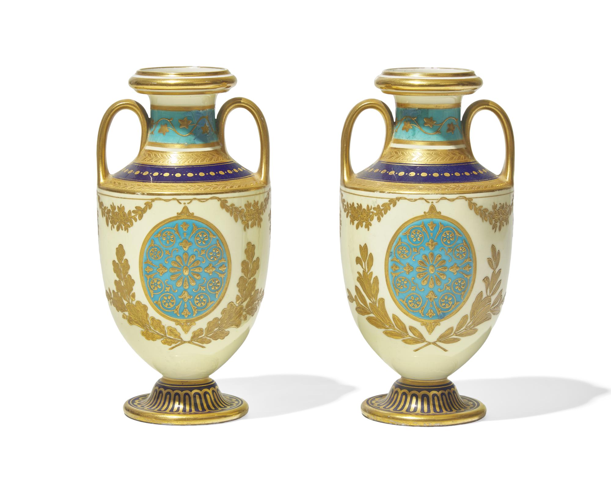 A Pair of English Gilt Decorated Porcelain Urns