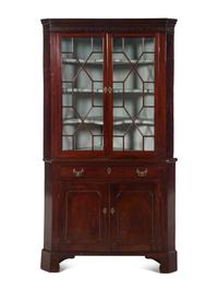 A George III Mahogany Corner Cabinet