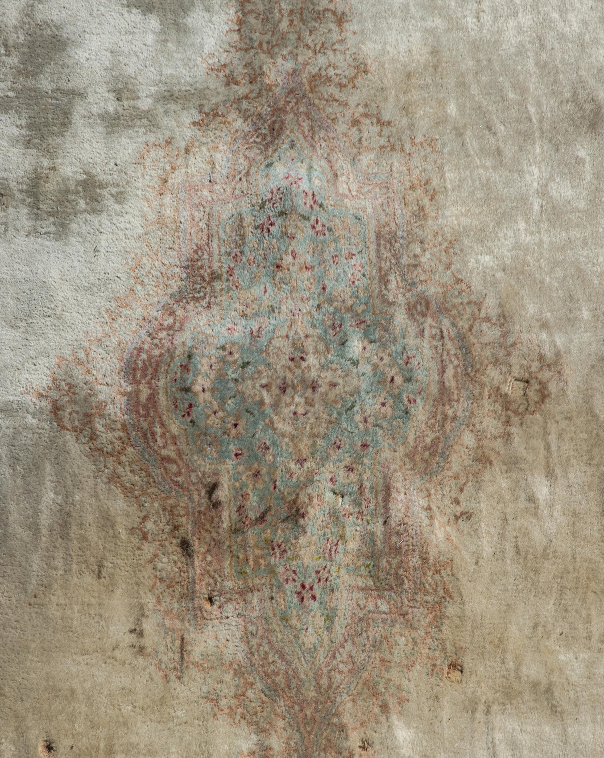 A Kerman Wool Rug — 20TH CENTURY