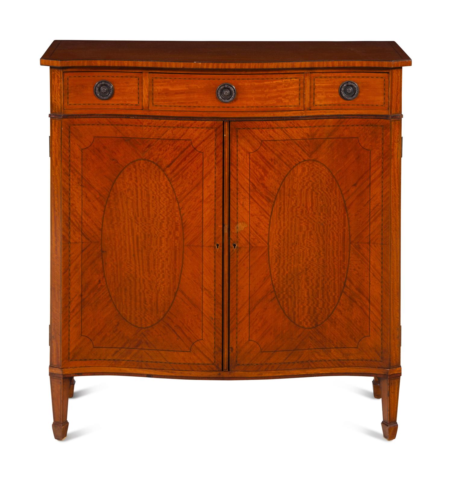 A George III Style Satinwood Serpentine Cabinet