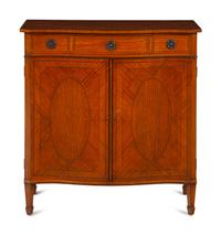A George III Style Satinwood Serpentine Cabinet
