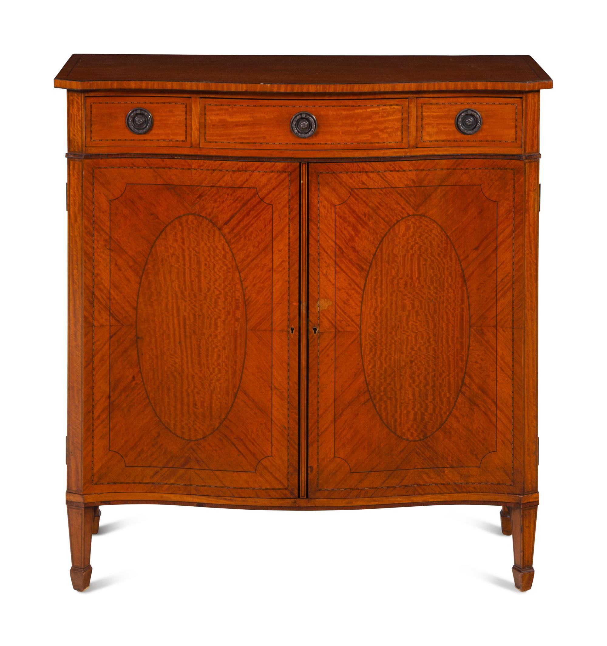 A George III Style Satinwood Serpentine Cabinet