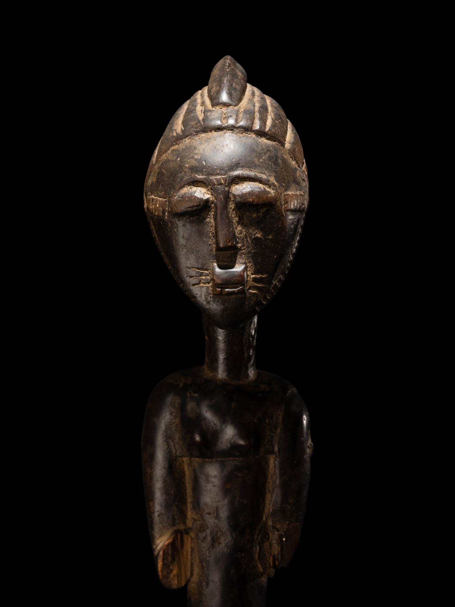 An African Carved Staff Top or Finial