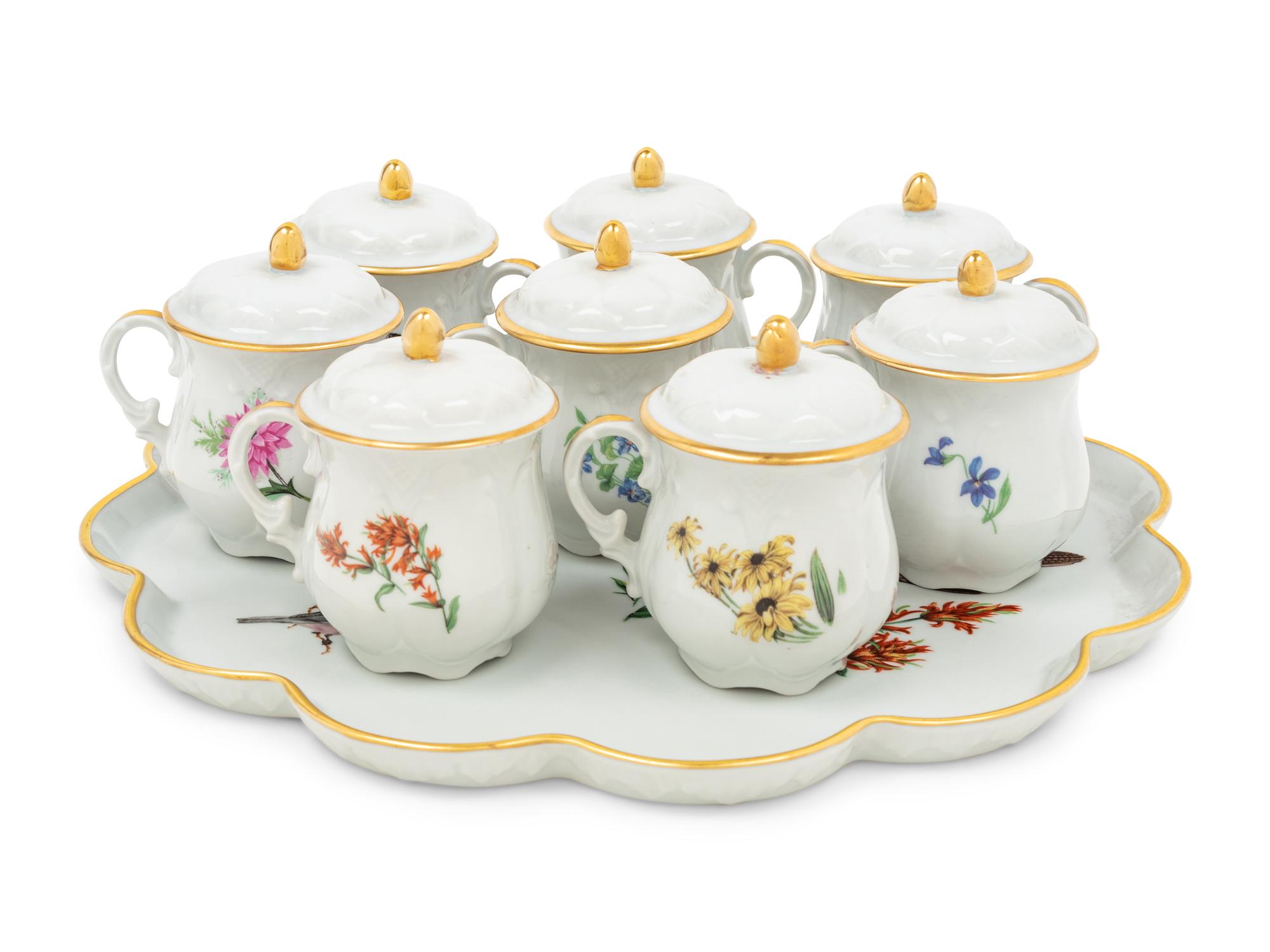 A Set of Eight Limoges Porcelain Pots-de-Creme