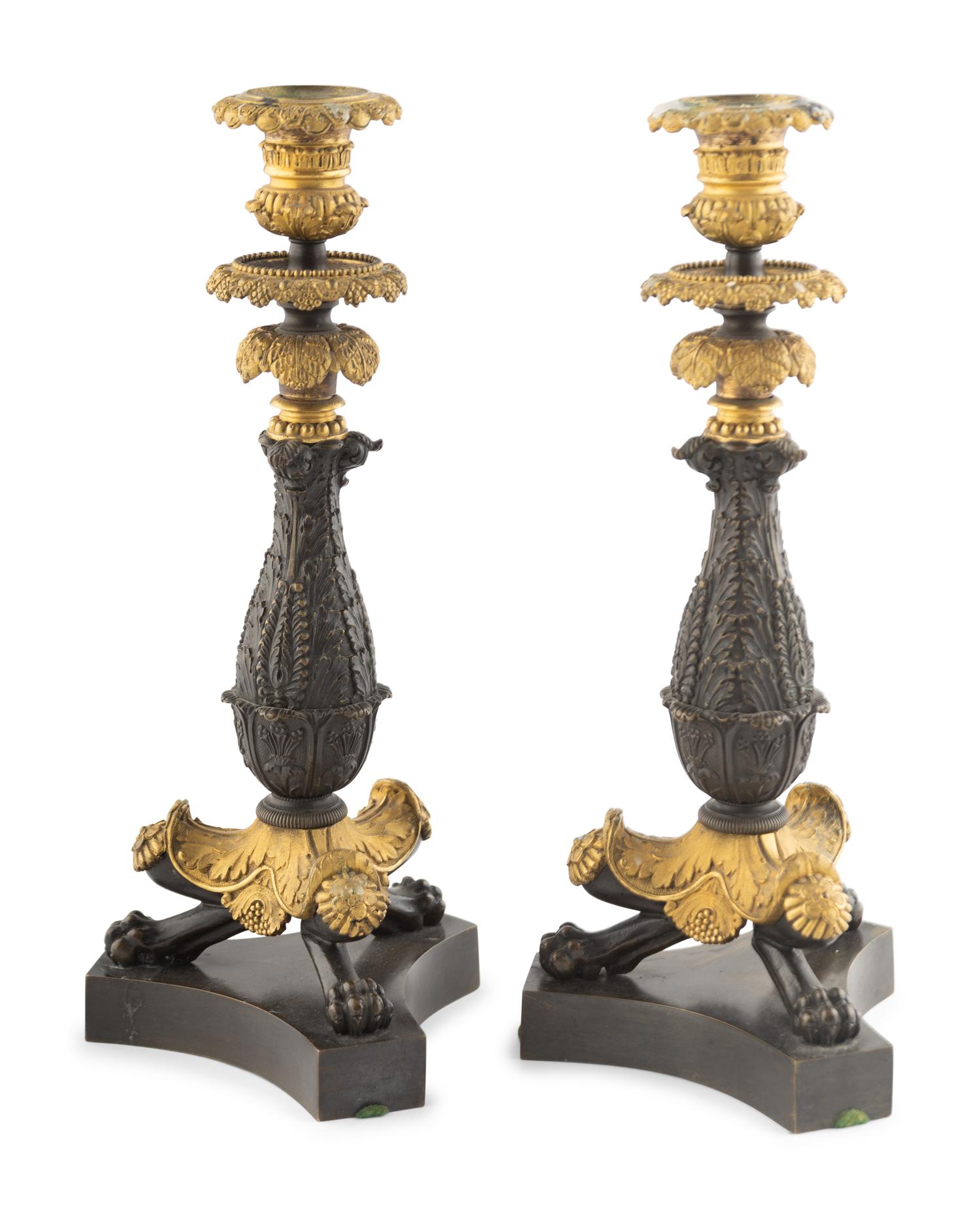 A Pair of Louis Philippe Gilt and Patinated Bronze Candlesticks