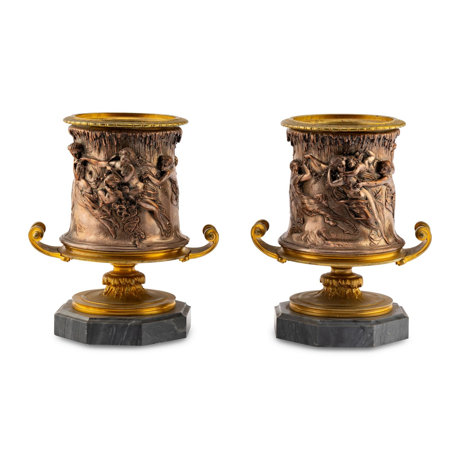 A Pair of French Gilt and Silvered Bronze Urns