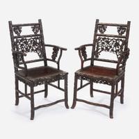 An unusual pair of Chinese carved hardwood armchairs 中国硬木扶手椅一对 Late 19th to early 20th Century ?????????????