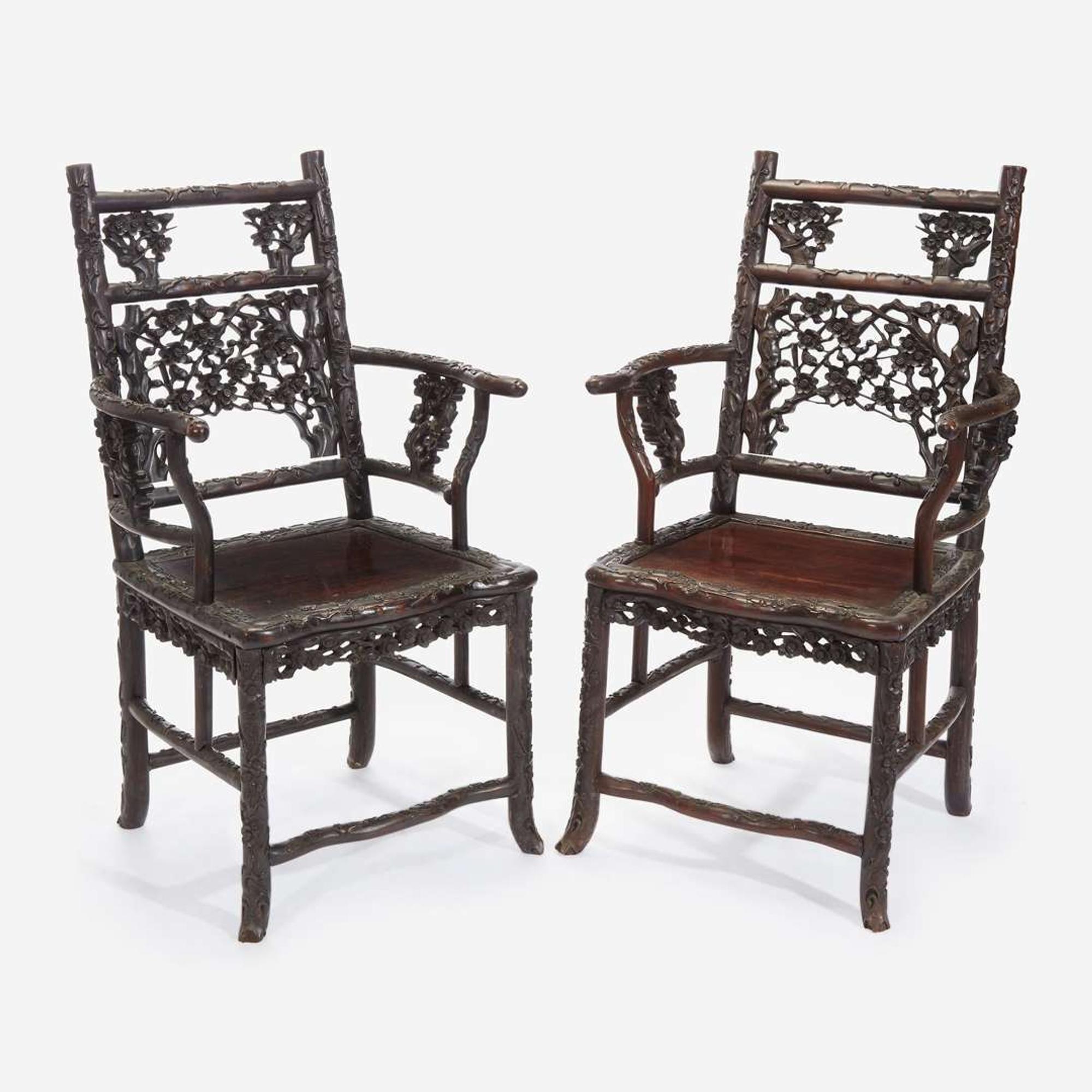 An unusual pair of Chinese carved hardwood armchairs 中国硬木扶手椅一对 Late 19th to early 20th Century ?????????????