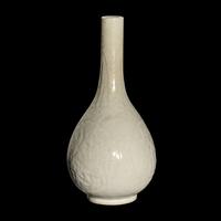 A Chinese Molded White Glazed Porcelain Bottle Vase, 18th/19th Century 清中期 白釉模印如意纹膽瓶