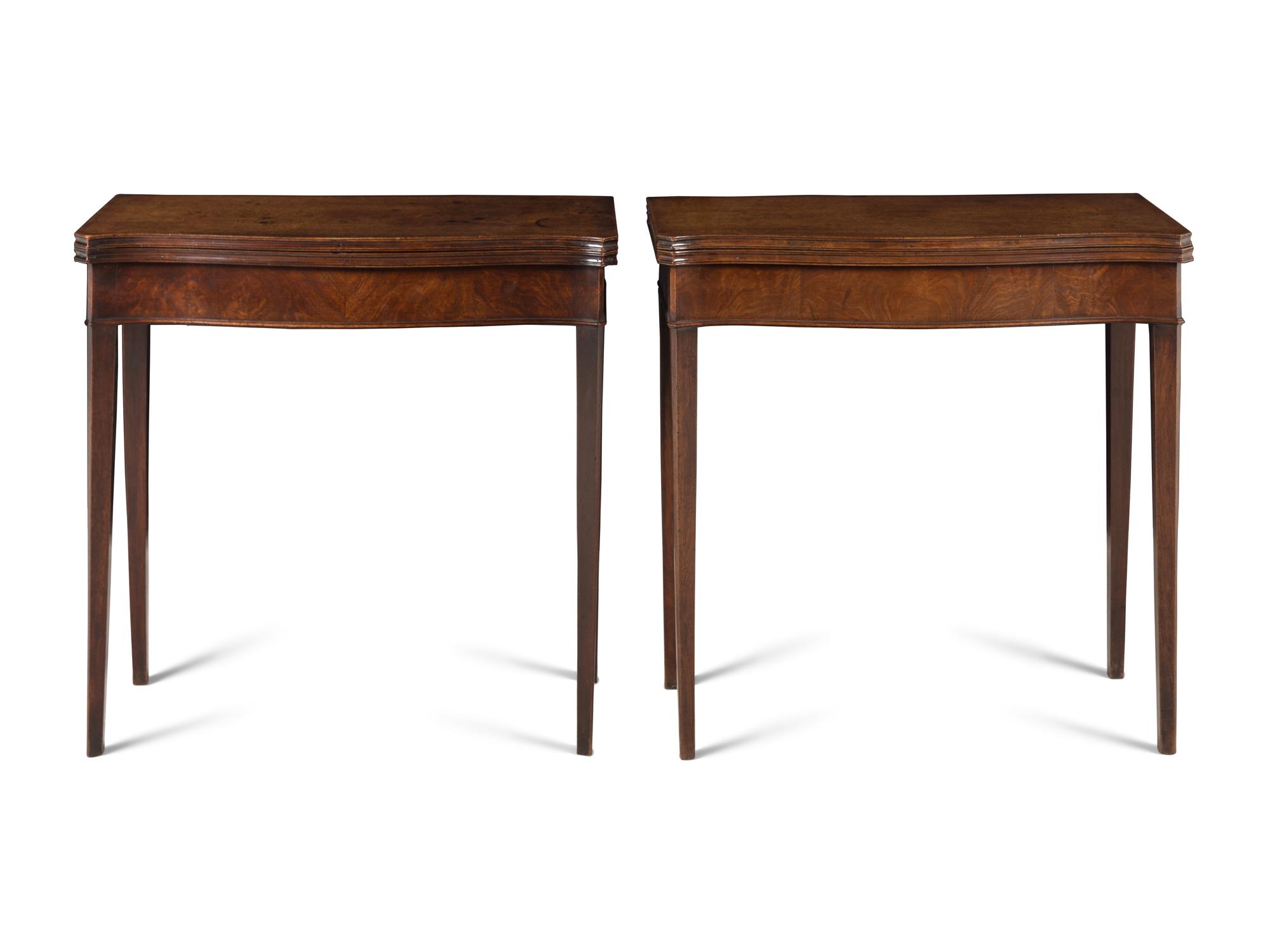 A Pair of George III Mahogany Games Tables