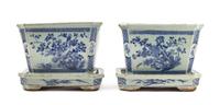 A Pair of Chinese Blue and White Porcelain Jardinieres with Underplates 20TH CENTURY OR EARLIER Length 9 1/2 x height 7 1/2 inches. — 20TH CENTURY OR EARLIER