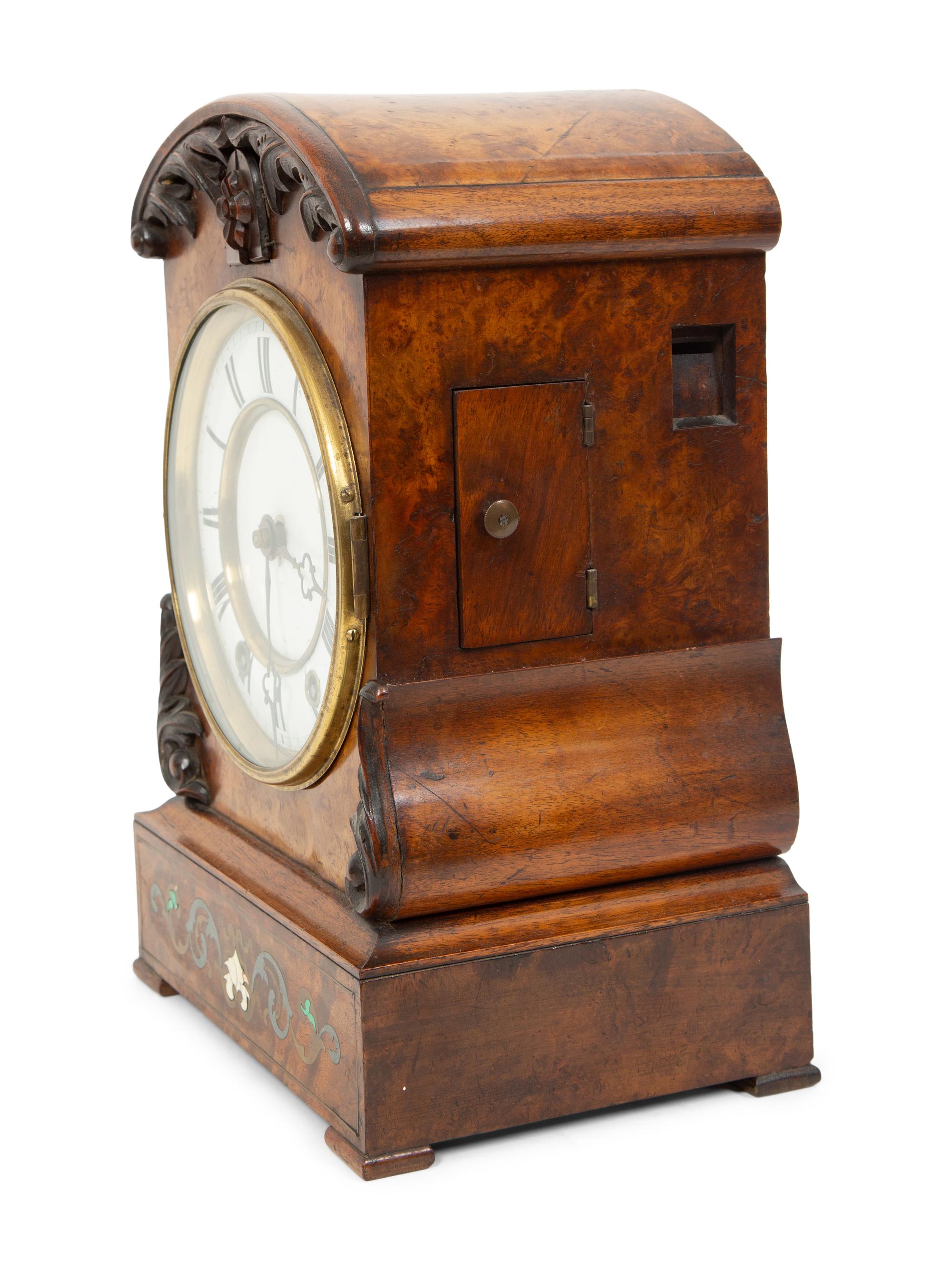 A Black Forest Inlaid Burr-Walnut Cuckoo Clock