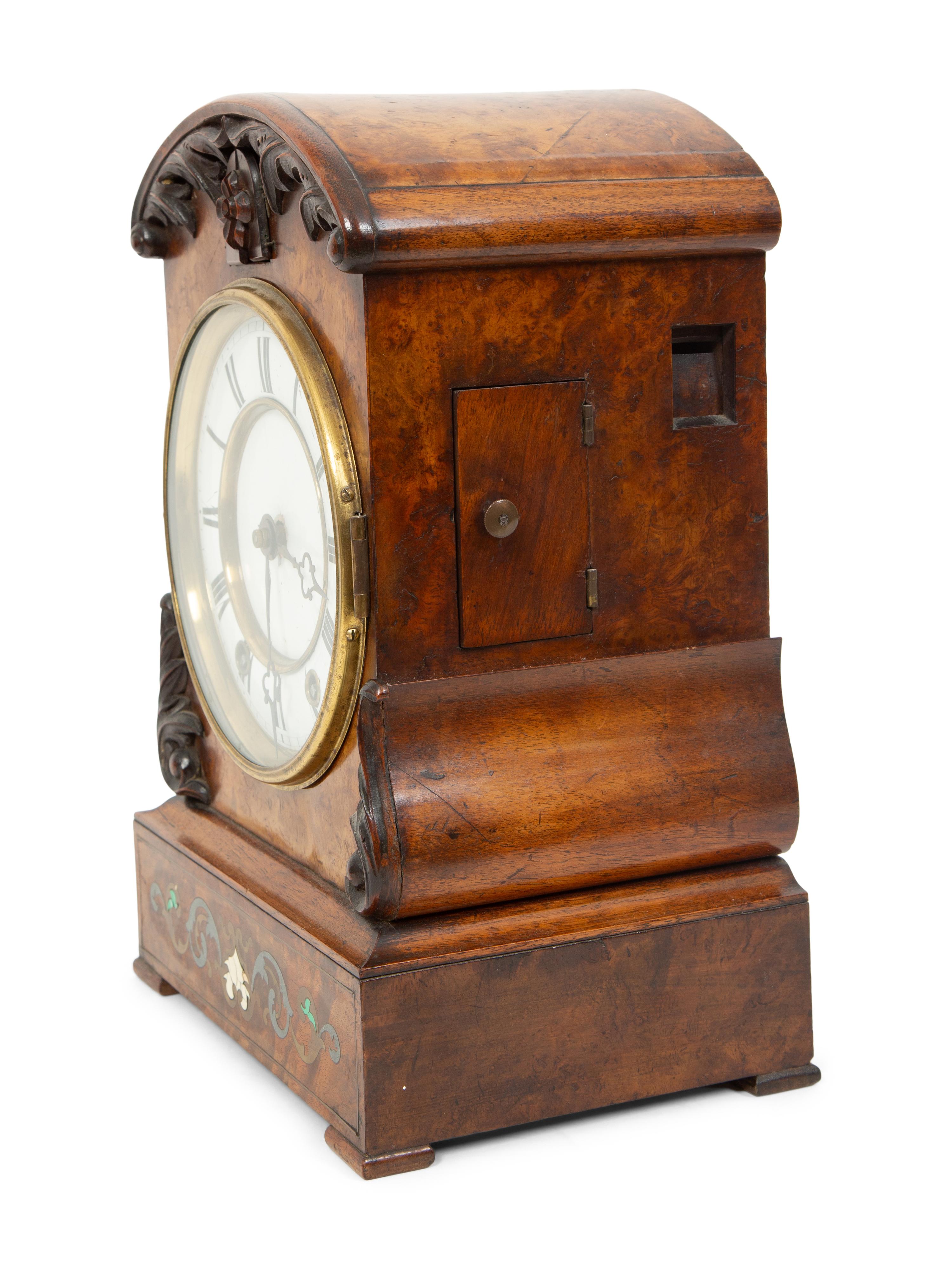 A Black Forest Inlaid Burr-Walnut Cuckoo Clock