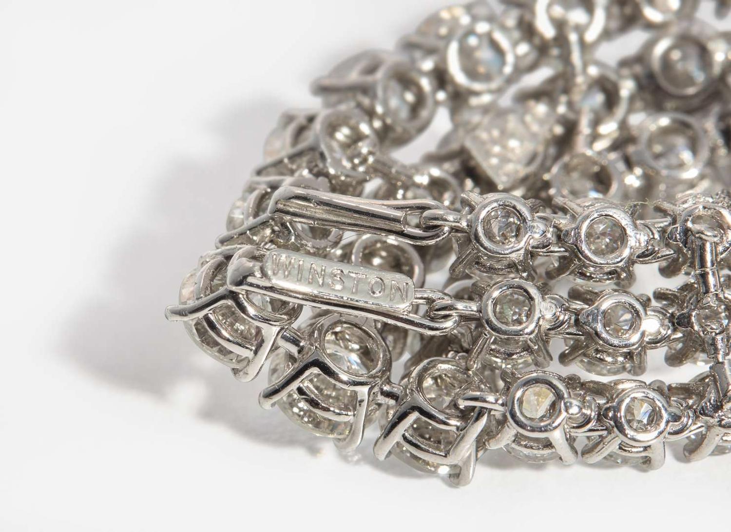 A Pair of Harry Winston Platinum and Diamond Earrings Harry Winston