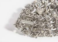 A Pair of Harry Winston Platinum and Diamond Earrings Harry Winston