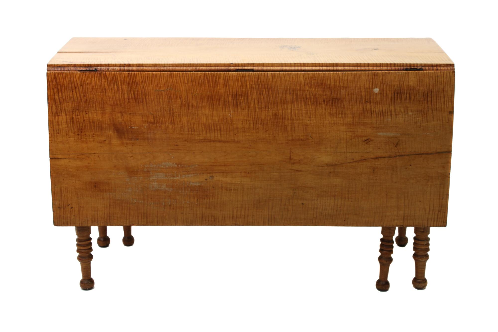 An American Tiger Maple Gate-Leg Table Height 28 1/4 x width 47 1/2 x depth 20 inches