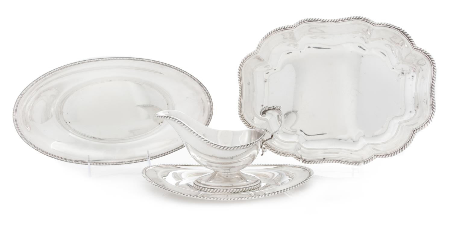 A Group of Four American Silver Holloware Articles, Various Makers, 20th Century, comprising a sauce boat, two bread dishes and a veget
