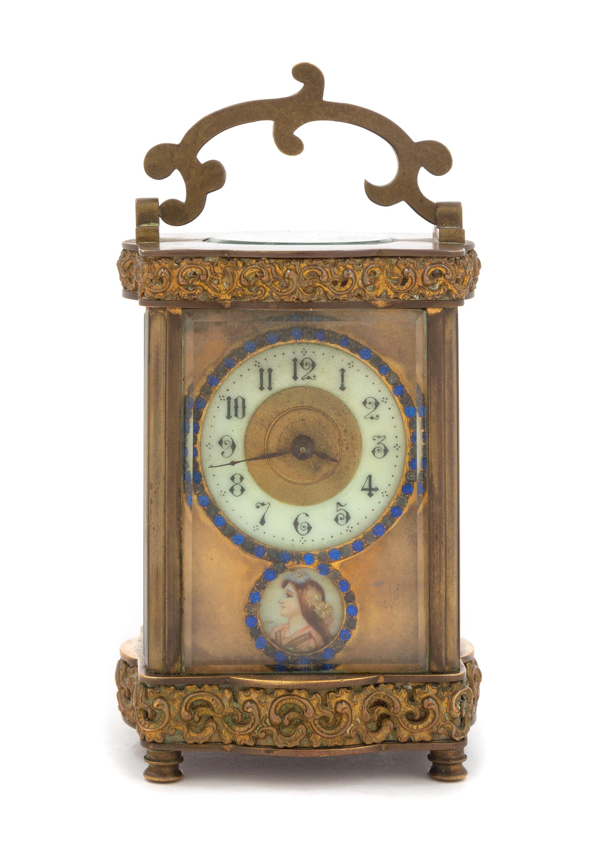A French Brass Carriage Clock Height 5 inches. — LATE 19TH/EARLY 20TH CENTURY