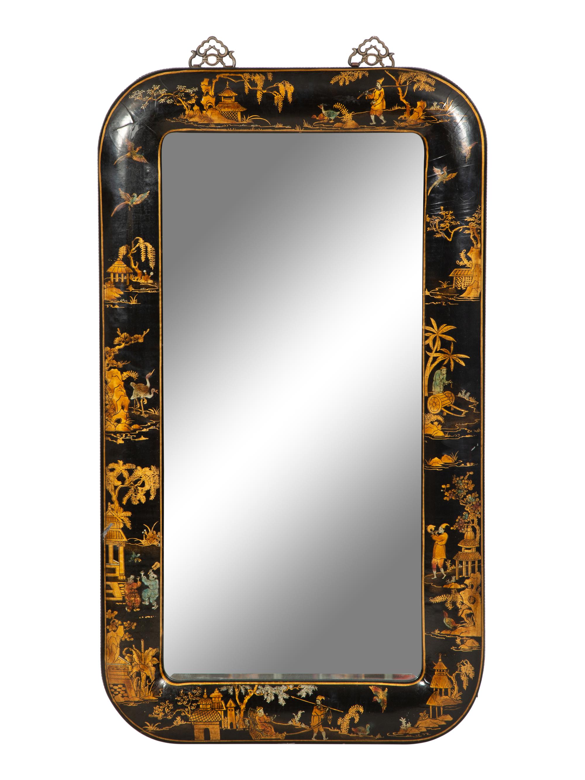 A Black Japanned Cushion Mirror