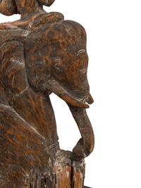 A Southeast Asian Carved and Painted Wood Group of an Elephant and Rider